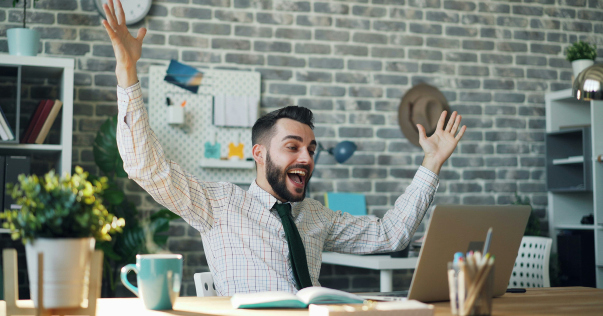 Happy office worker Unsplash
